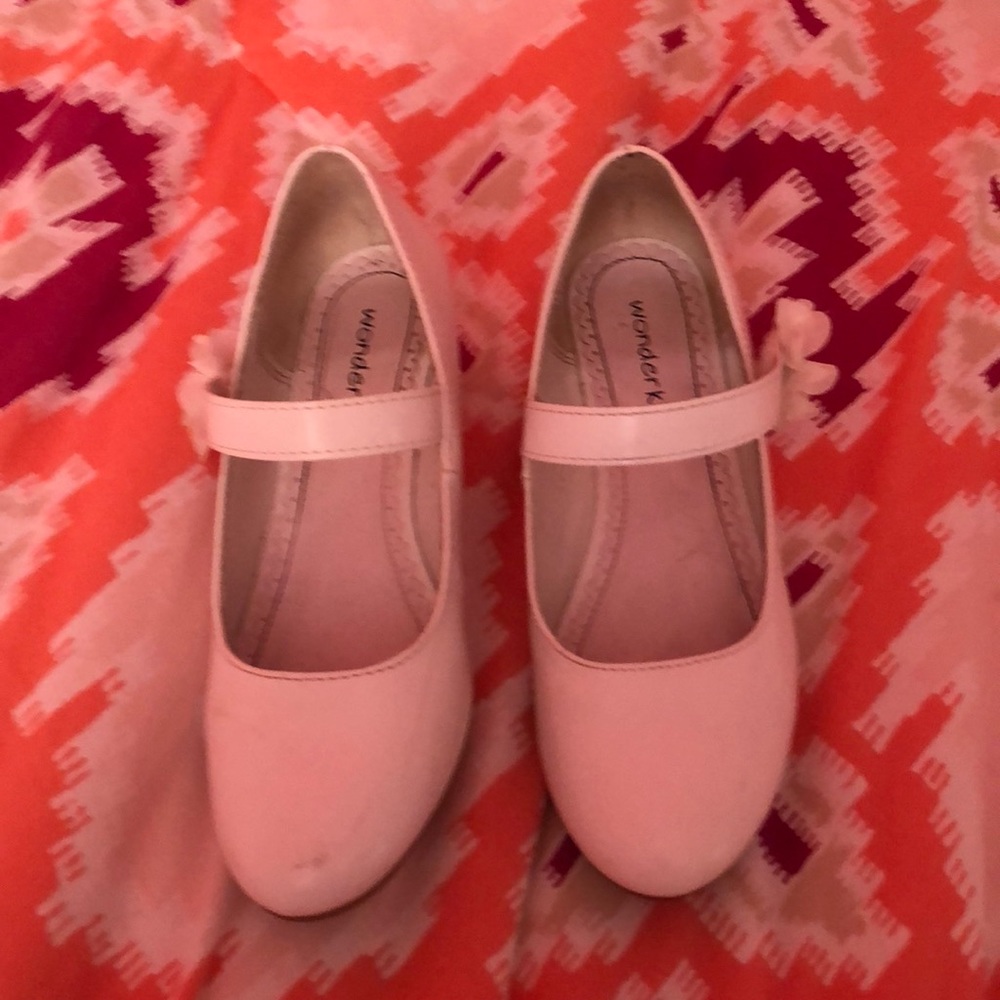 Girls wedges. Velcro strap that has a flower.